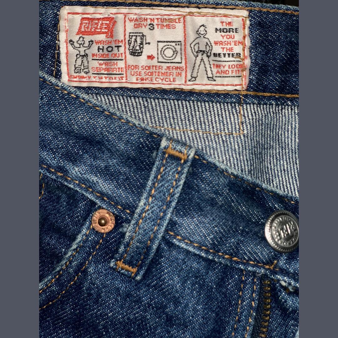 A pair of vintage jeans with a cool guide inside. “The more you wash’em the better they look and fit!”